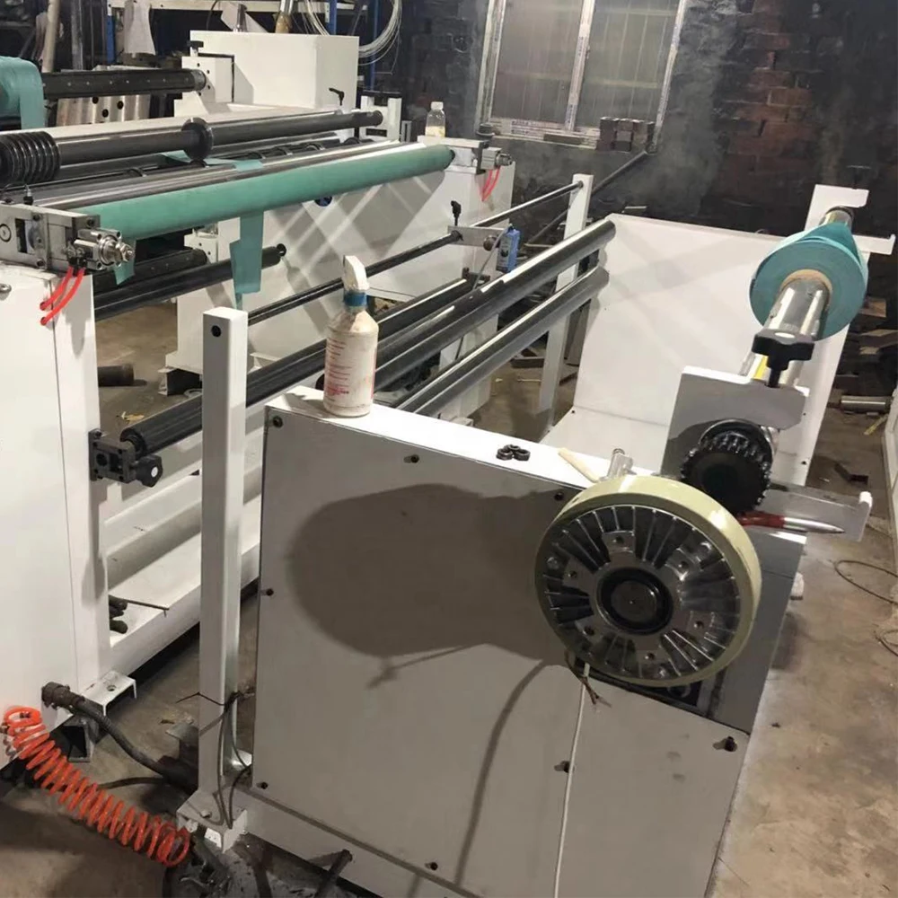 Non woven fabric/film jumbo roll slitting rewinding machine