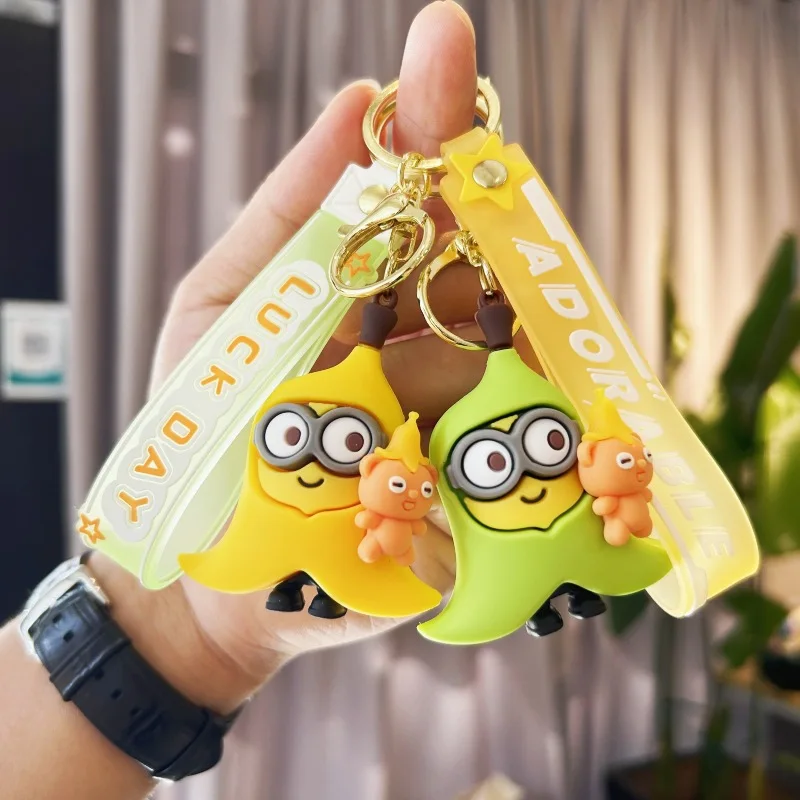 New creative cartoon cross dressing hoodie small yellow keychain PVC rubber pendant doll student backpack pendant accessories