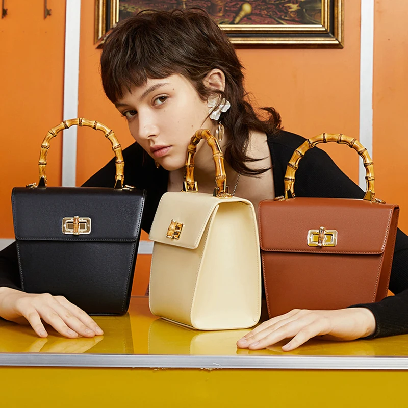 Trendy Unique Bamboo Handle Ladies Bucket Bags Chic Bamboo Premium Metal Lock Luxury Custom Logo Womens Bucket Bags