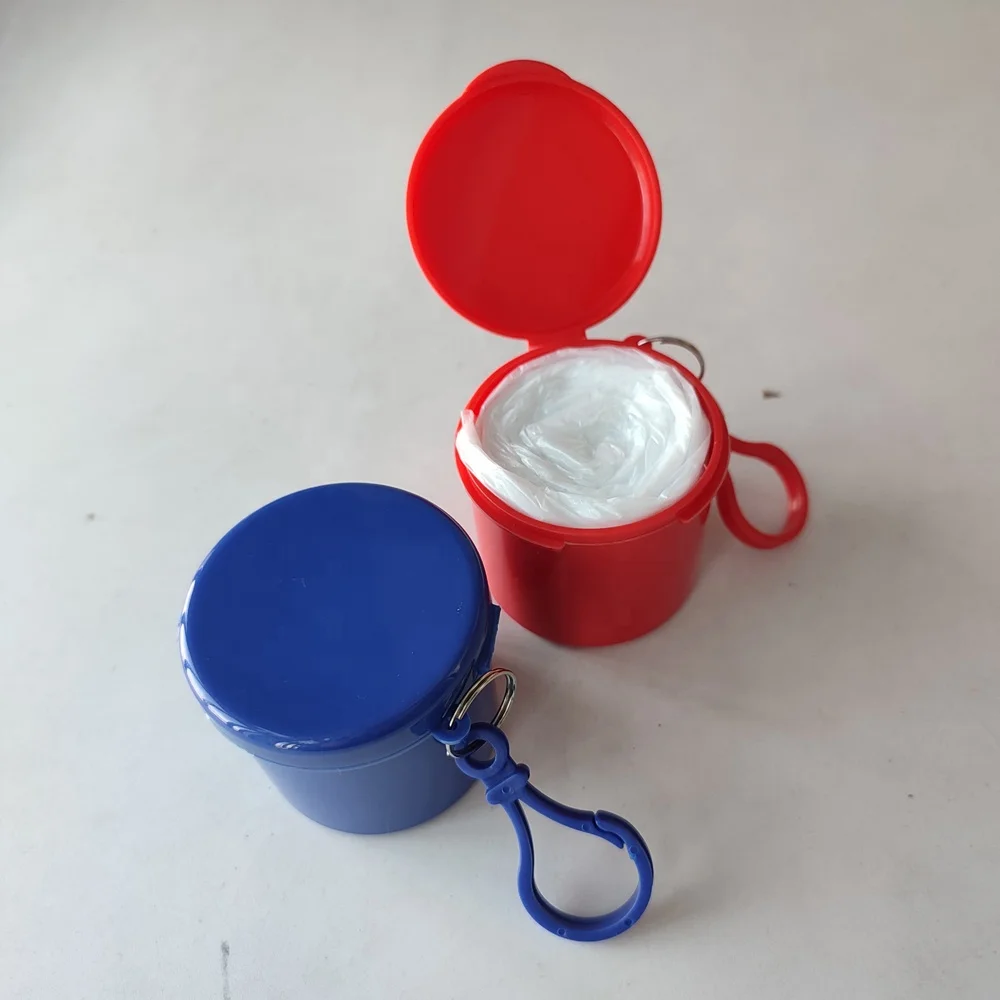 
disposable raincoat in a plastic round box 