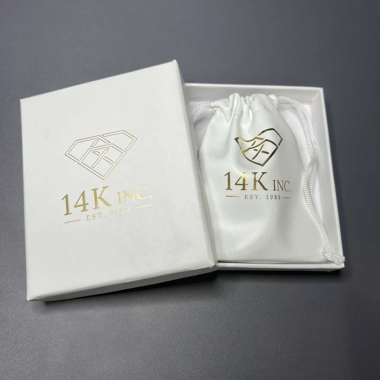 Customized Black and White PU Leather Bags Jewellery Drawstring Dust Embossed Logo Pouch Bags For Watch Headphone Accessory