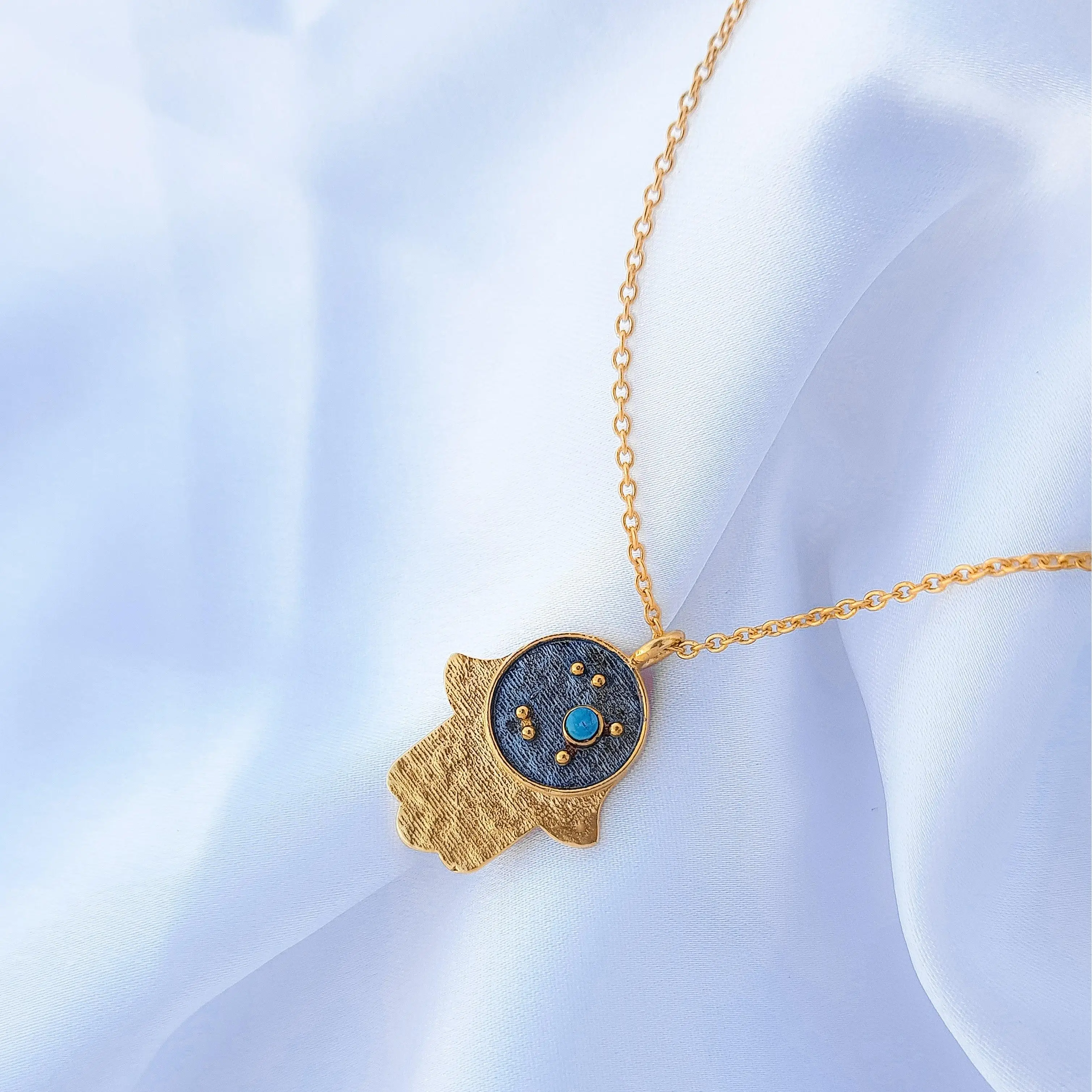 Sagittarius Zodiac Constellation chain necklace with Hamsa Charm and Turquoise birthstone in two tone black rhodium and 22k gold