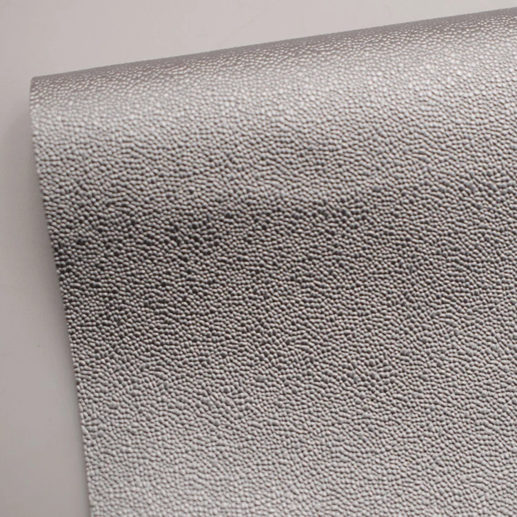 Guangzhou shaped grain embossed pu artificial leather for luggage packaging