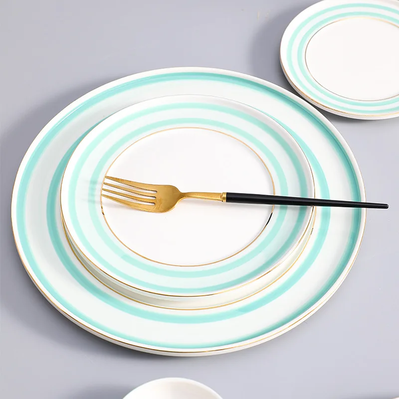 Wholesale bone china dinner set fine porcelain plate and bowls with gold rim dinner set