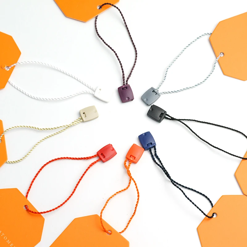 
 Cheap price in stock nylon plastic garment clothing seal cord loop lock price hangtag fastener hang tag with string for clothes  