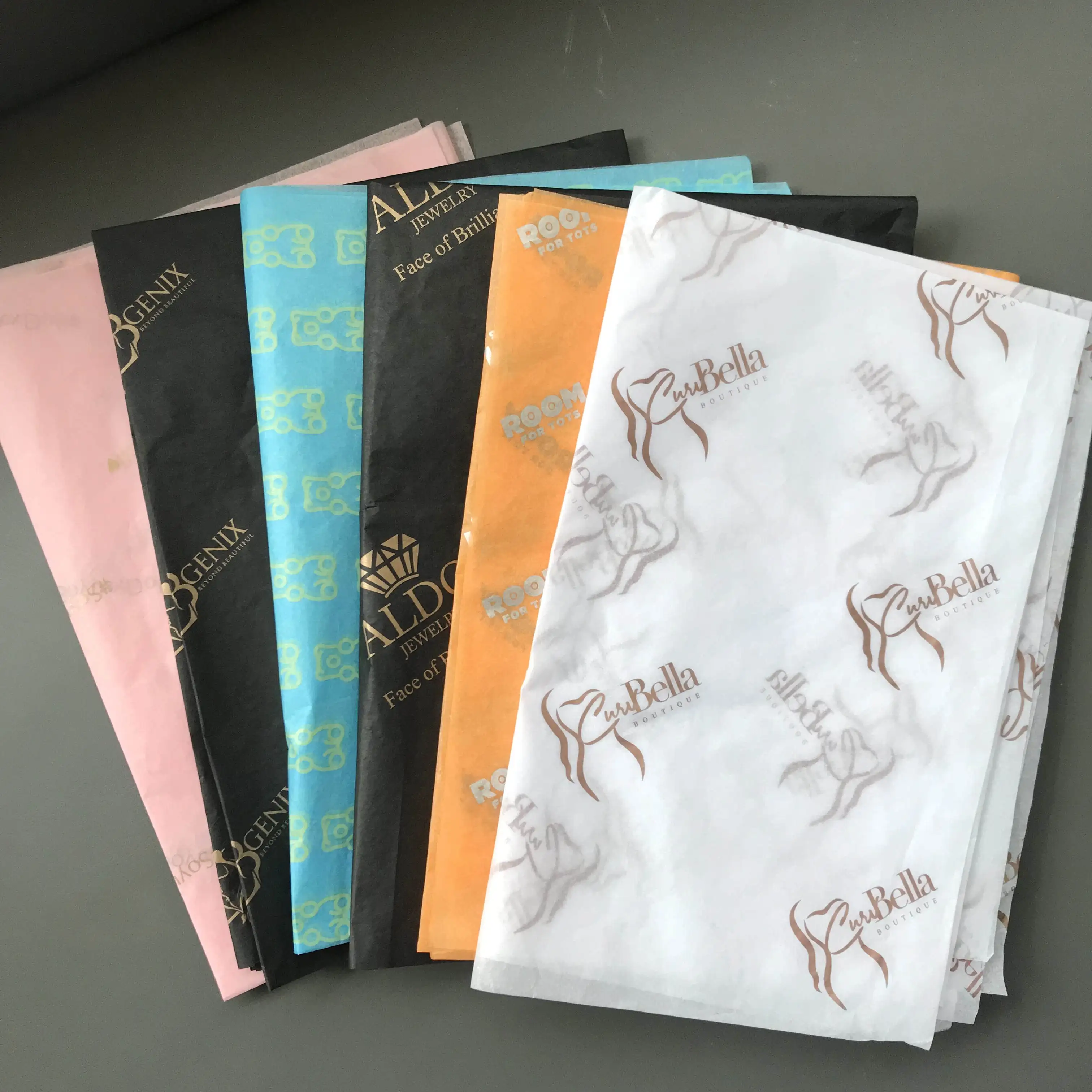 
China Guangzhou 17gsm logo printed Custom clothing wrapping paper printed roll sheet tissue wrapping paper for clothes eco 