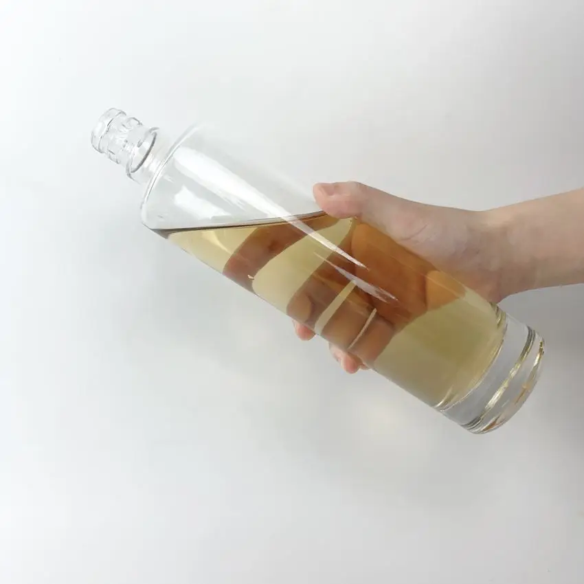 Long clear cylindrical glass alcohol bottle with thick bottom 500 ml