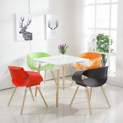
stock Leisure commercial minimalist modern design PP dining room Plastic chairs with wooden legs for living room 