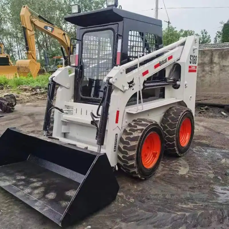 Подержанный малый погрузчик Bobcat S160 второй ручной с скользящей головкой тяжелое строительное оборудование хорошим состоянием