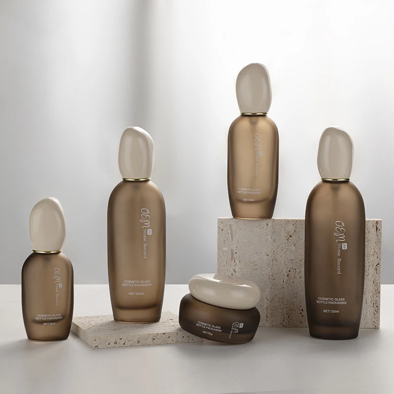 New design popular high end skincare cosmetic packaging glass bottles 30ml 50ml 100ml glass cosmetic serum lotion pump  bottle