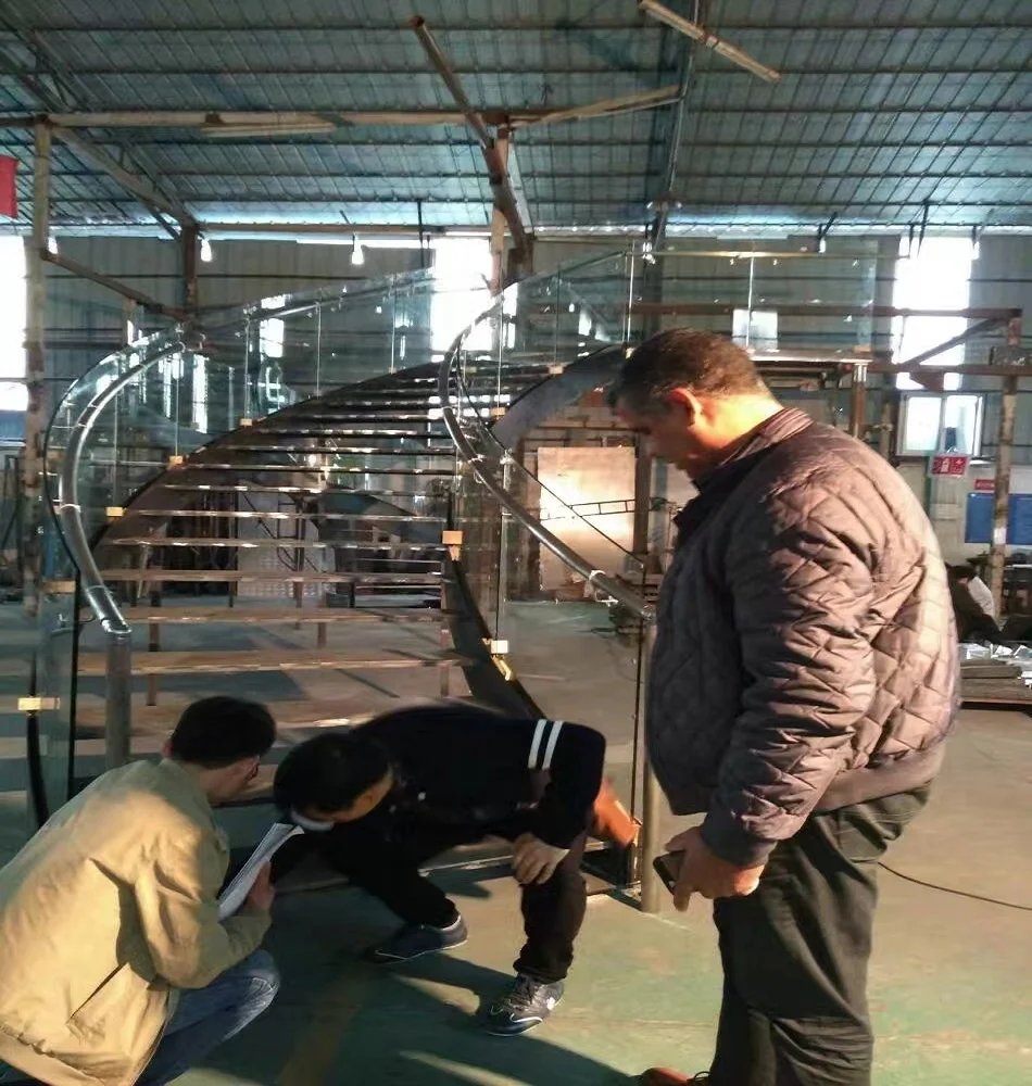 Stainless steel staircase Stainless steel curved stairs Stainless steel - glass curved stairs TS-473