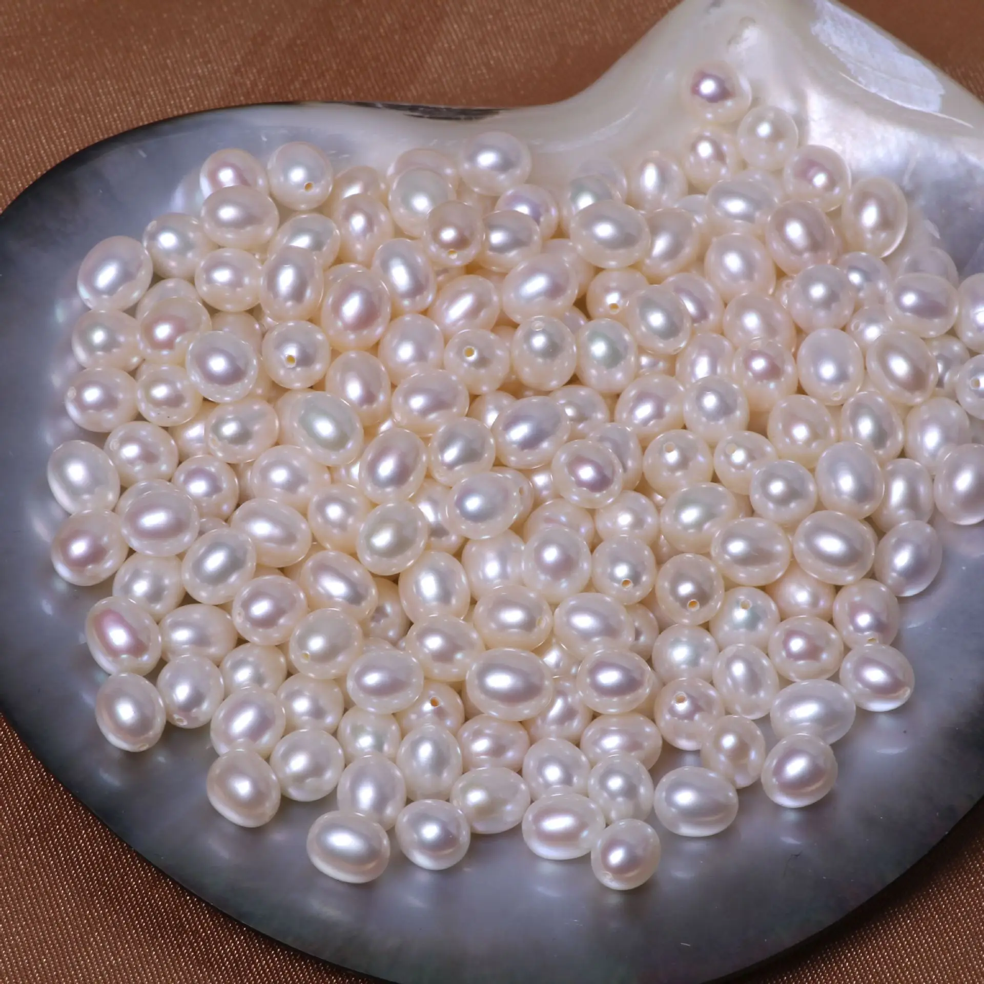 
Rice Beads Wholesale Most Popular Topping Pearls Fresh Water Basically Flawless Loose Pearl 