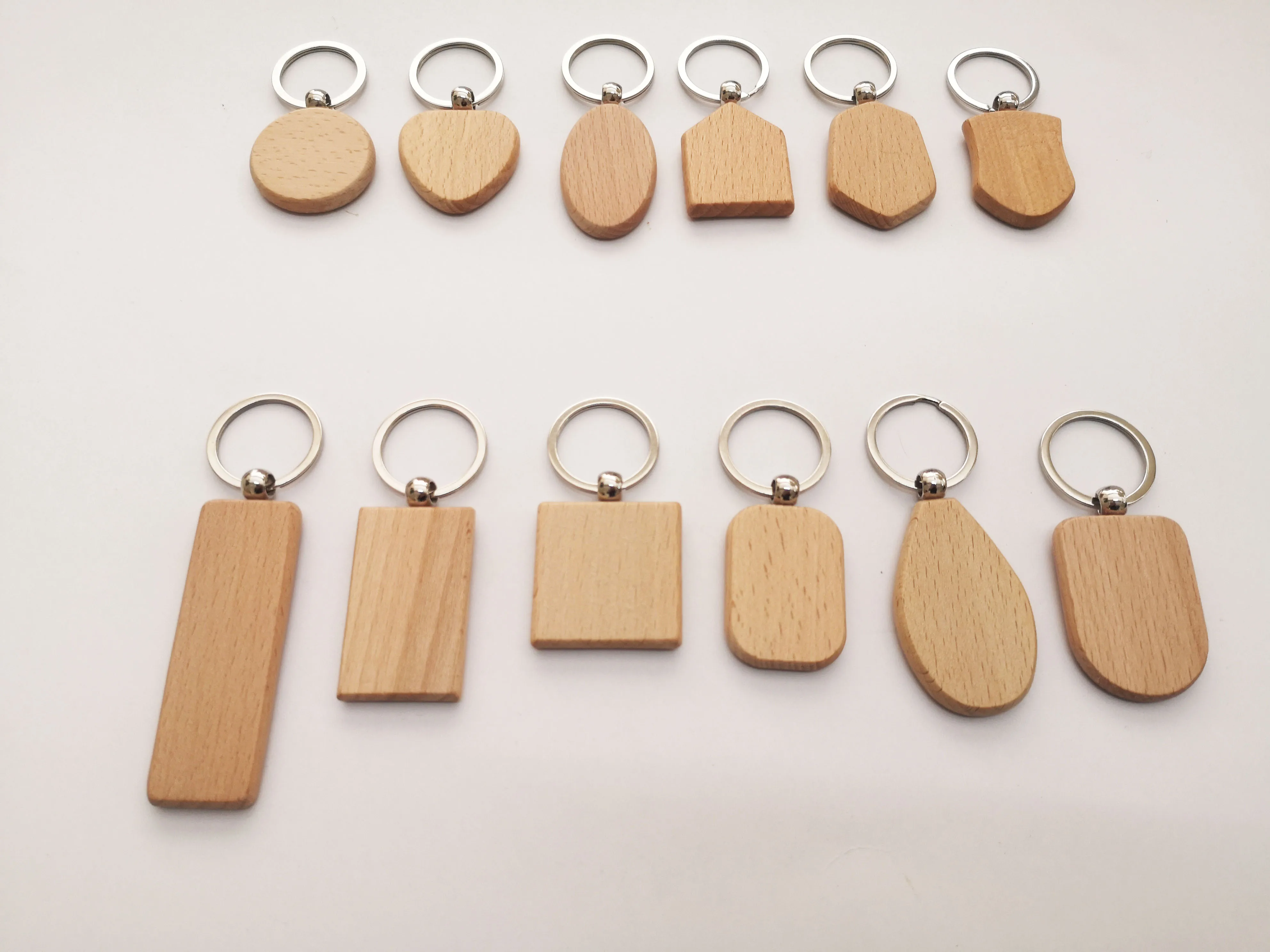 No MOQ DIY blank beech wood key ring, customized laser/printing  LOGO geometric wooden carving keychain