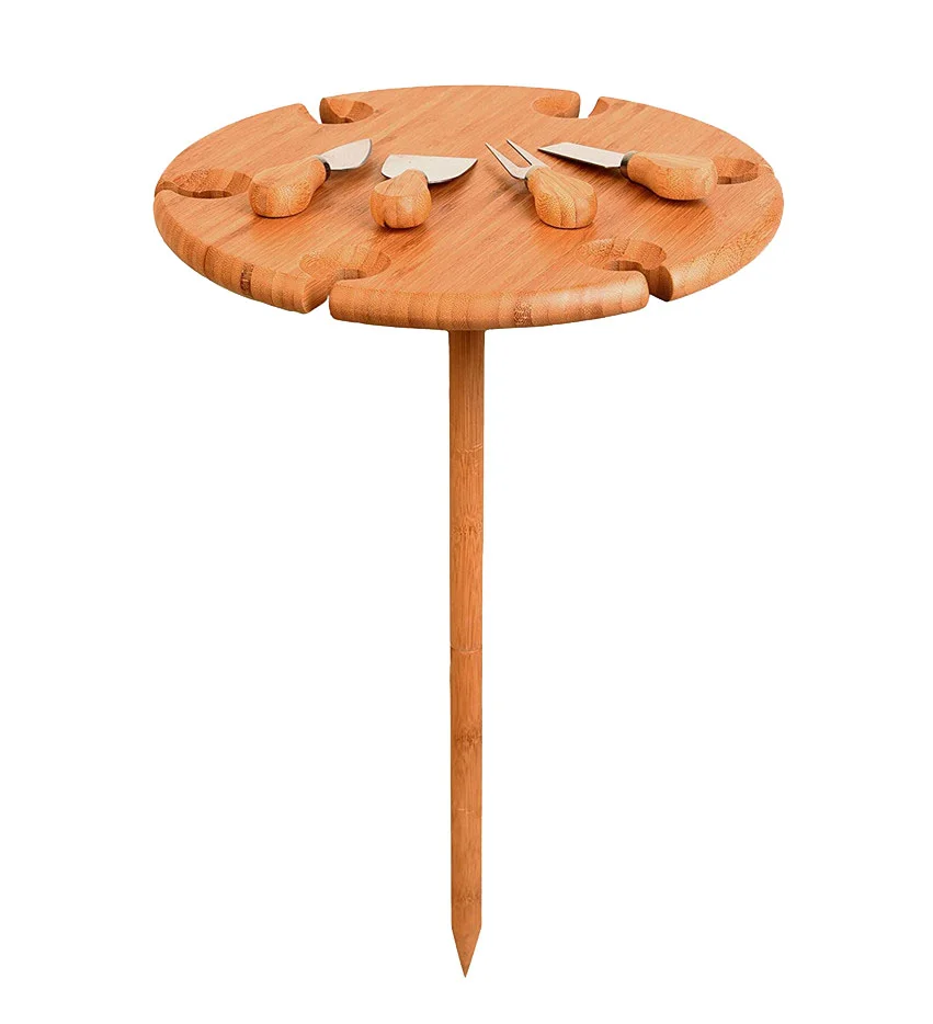 Round bamboo picnic table with knives & wine glass holders