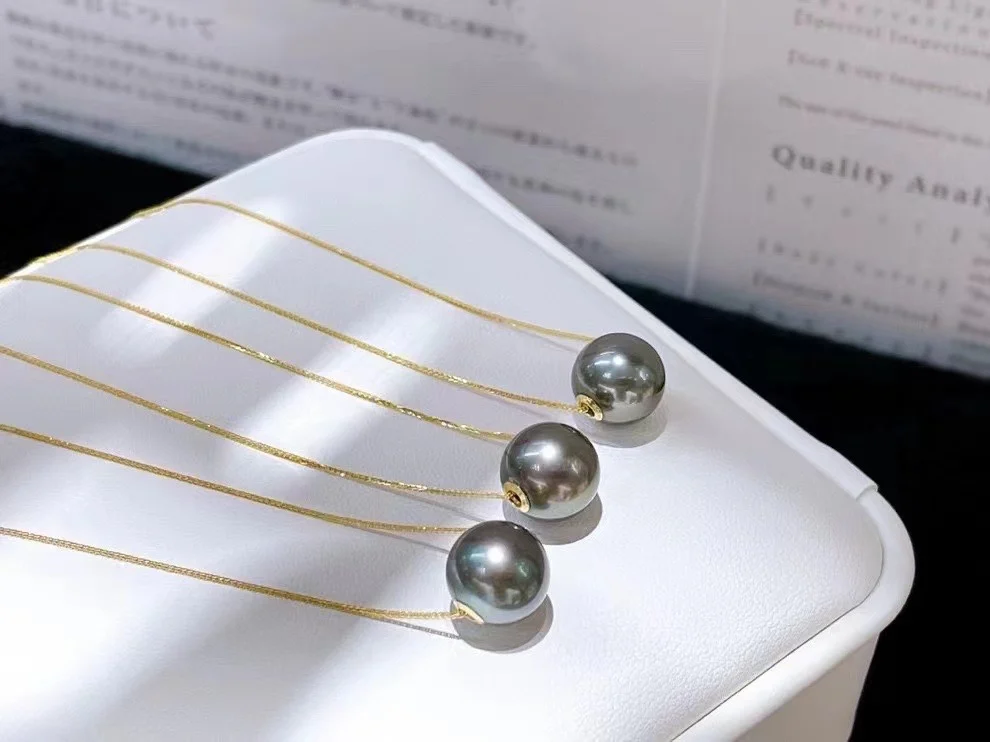 Custom 18k gold natural 11~10mm seawater black pearl necklace price