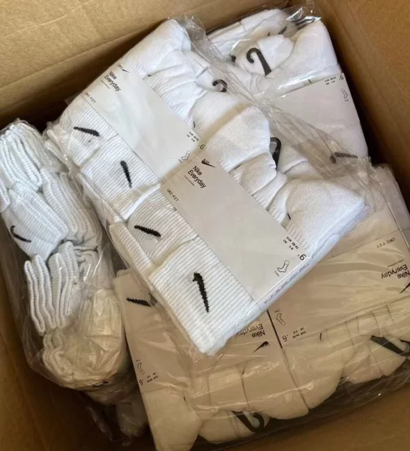 Bulk wholesale 6pack cushion cotton sport socks custom logo basketball long athletic socks for men