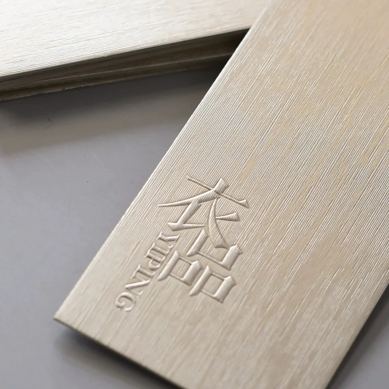 Luxury Custom Logo 500g Brushed Light Gold Special Paper Embossed Swing Tag Clothes Label Hang Tags