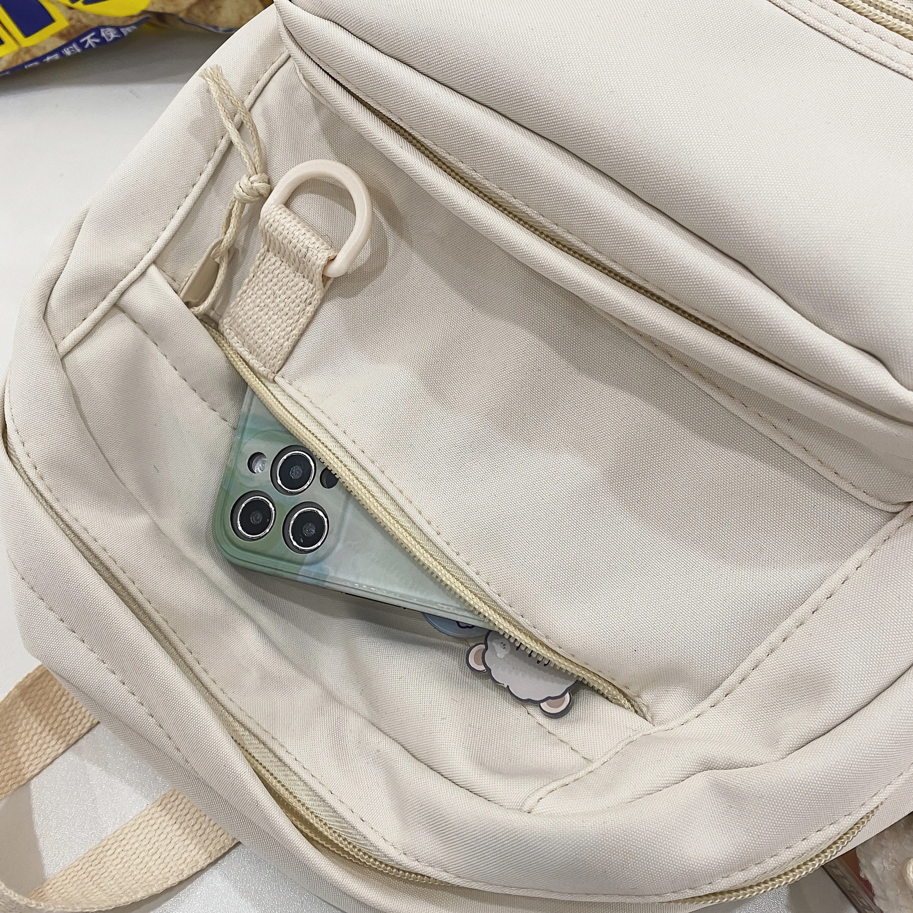 Hot sale new design large capacity cheap waterproof nylon teenagers school bags wholesale custom logo backpack