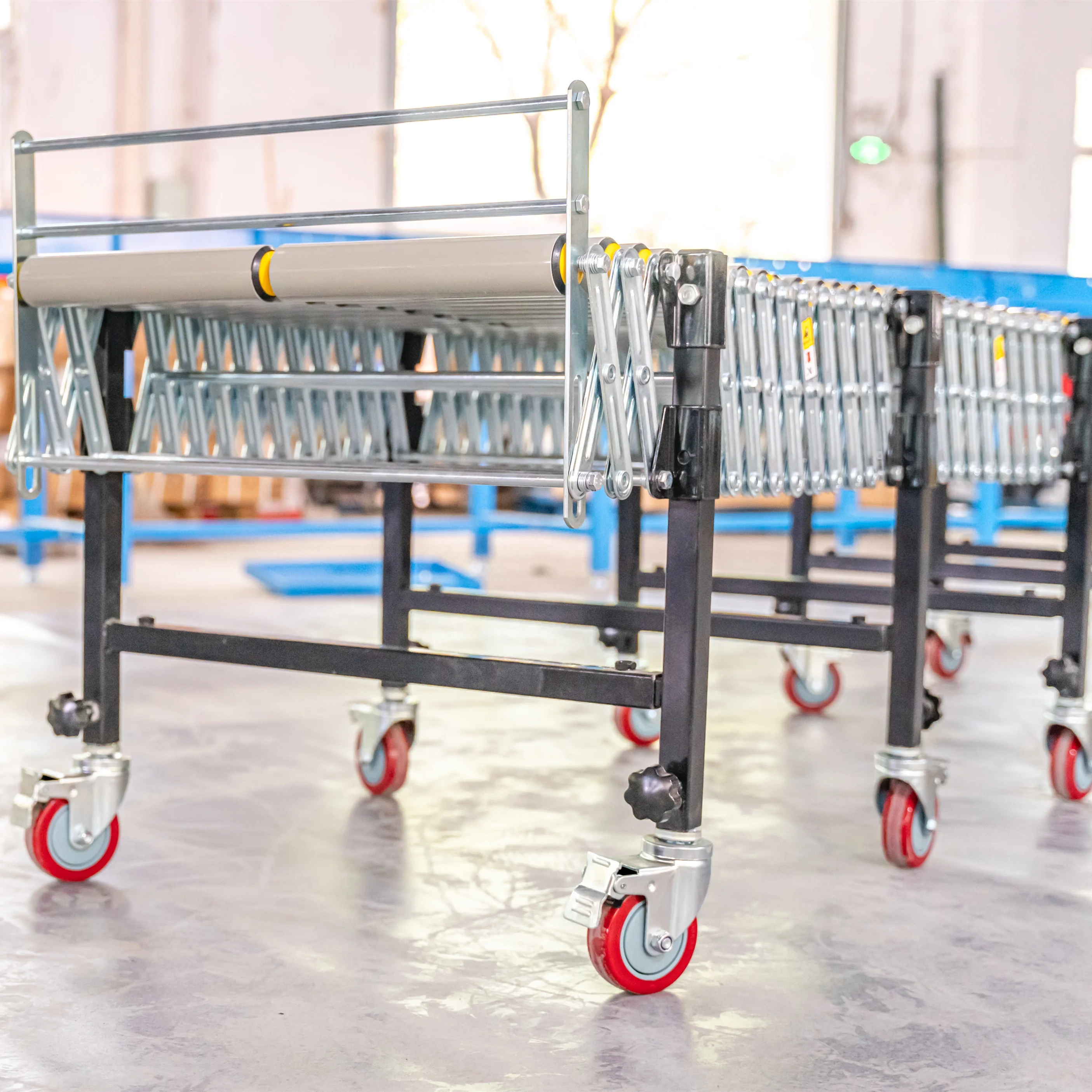 Тяжелый гибкий роликовый конвейер для разгрузки контейнеров