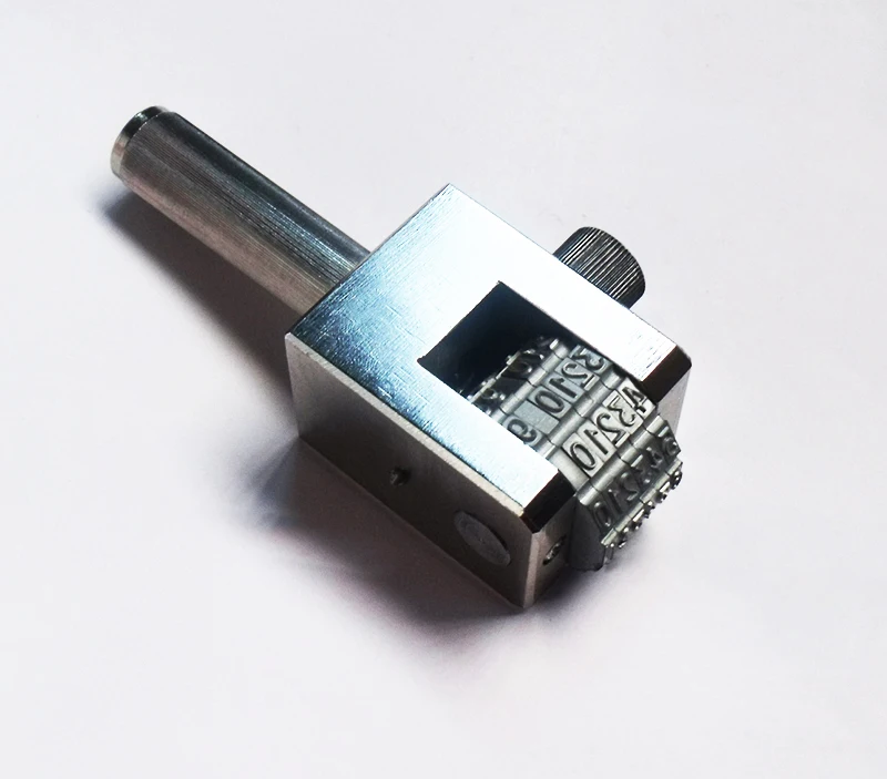 numbering head by hand press printing number on metal