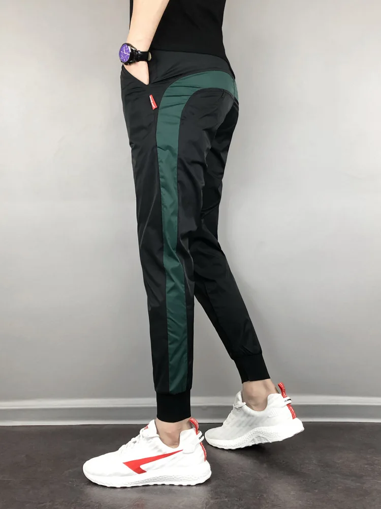 FanLi Men Loose Fit Reflective Printing Drawstring Windbreaker Mesh Lined Sport Track Pants