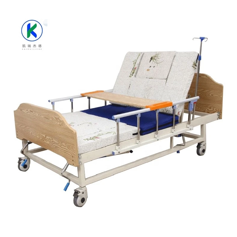 Medical Manual Bed for Home Care with Wooden Head Board and Toilet and Mattress