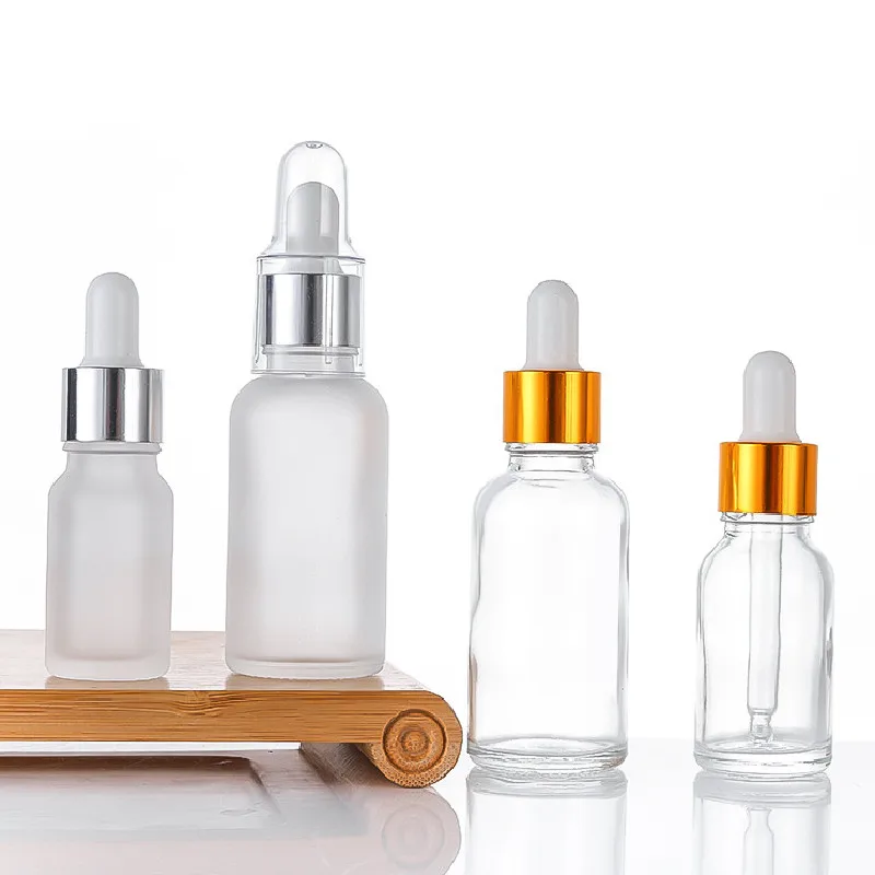 Transparent clear glass dropper serum bottles 5ml 10ml 15ml 20ml 30ml with dropper lid Manufacturers