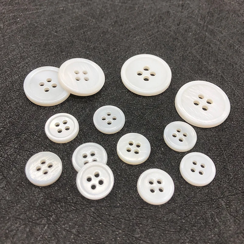 yiwu wintop 1000pcs per bag hot sale 4 hole round white small natural mother of pearl shell buttons for dress skirt