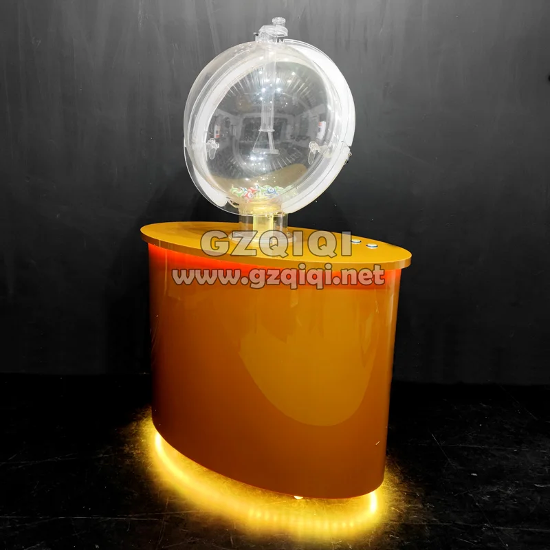 Popular Mark Six Lottery Machine to draw 6+1 balls out in golden machine box