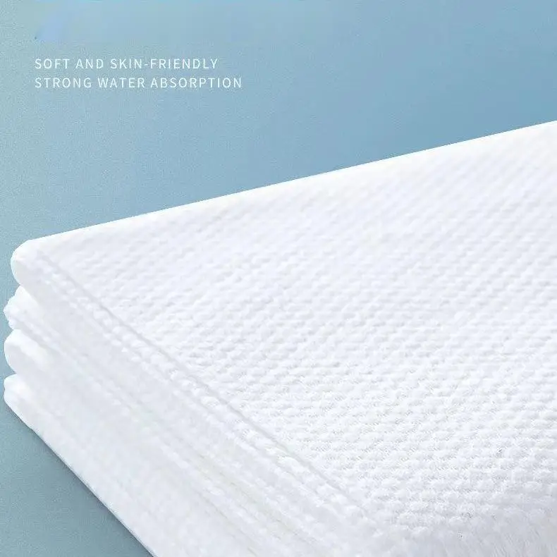 Customized 135 * 60 cm independent packaging biodegradable non-woven fabric travel hotel disposable white bath towel