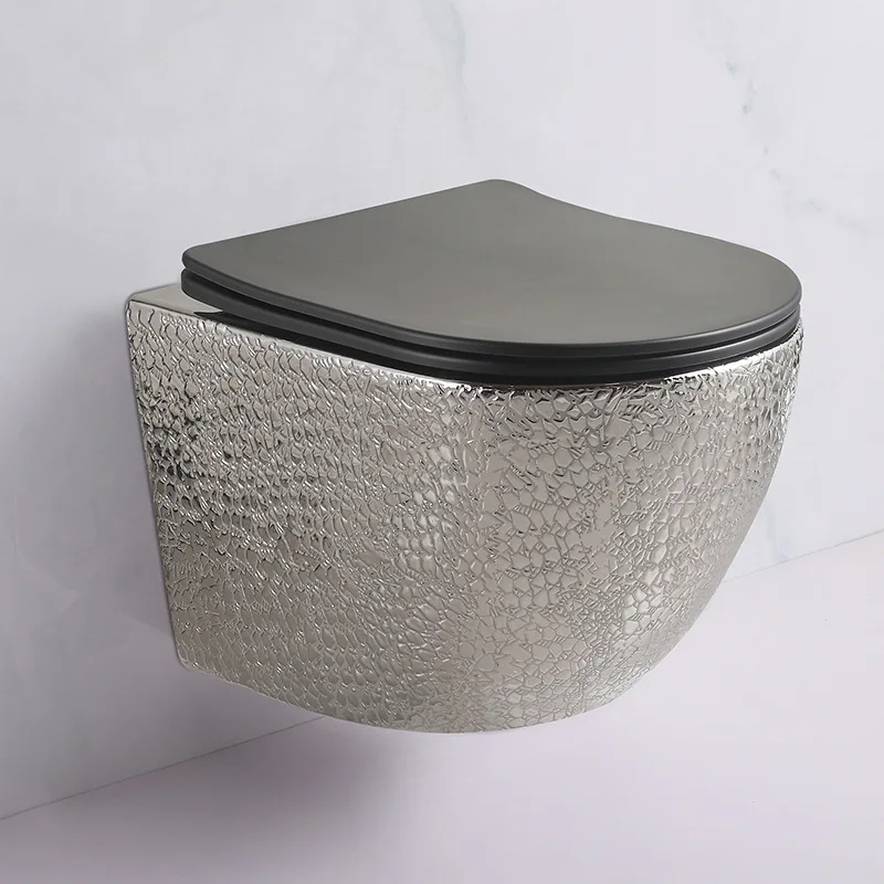 2023 newest modern luxury  ceramic human toilet with golden seat cover  ceramic tile toilet for mid east market