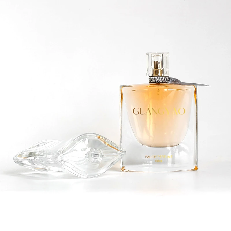 Wholesale high-quality custom perfume packaging Clear glass bottle 75ml with an elegant box.