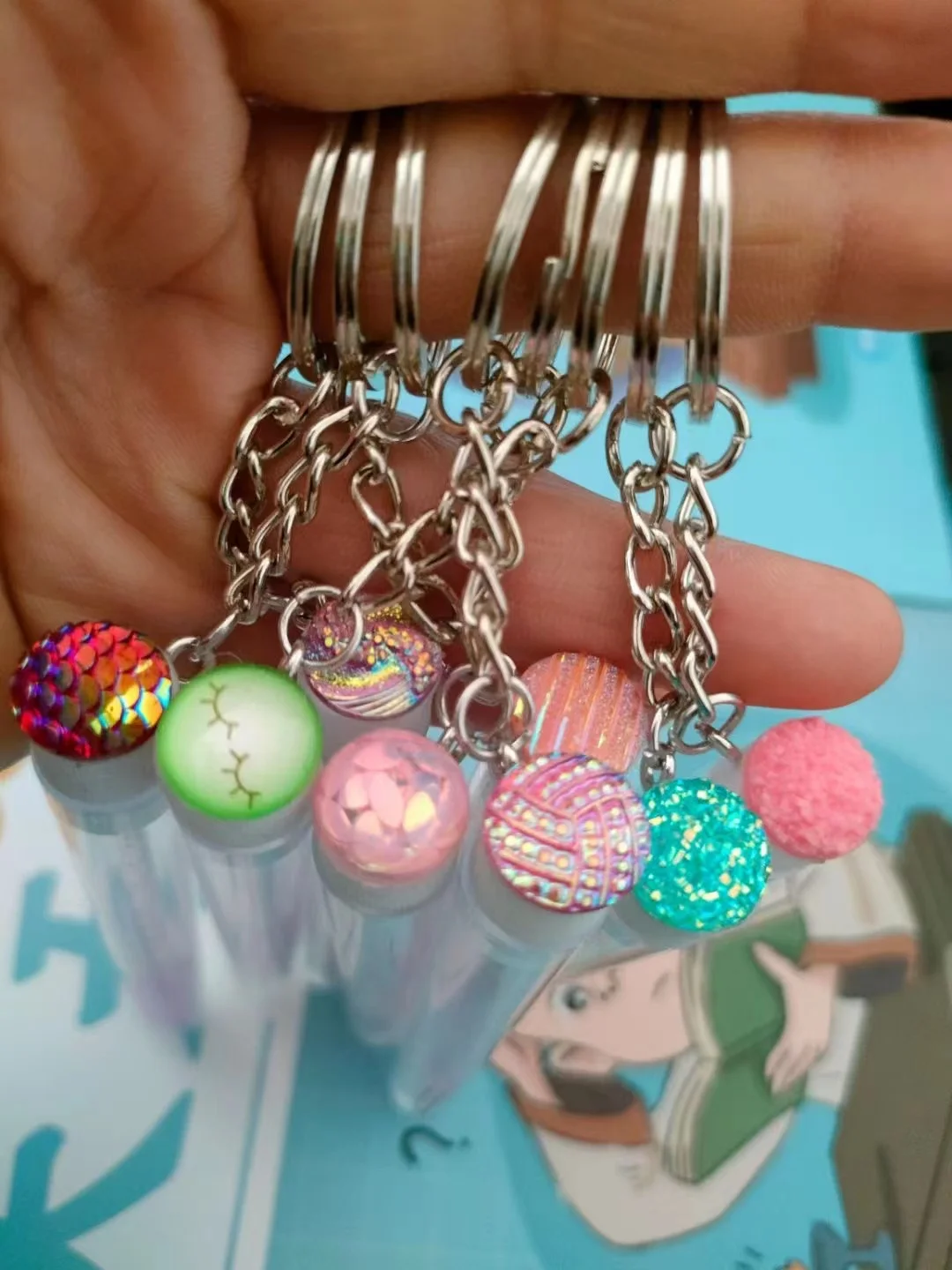 Wholesale OEM lash spoolie unique eyelash brush empty mascara tubes with brush keychain