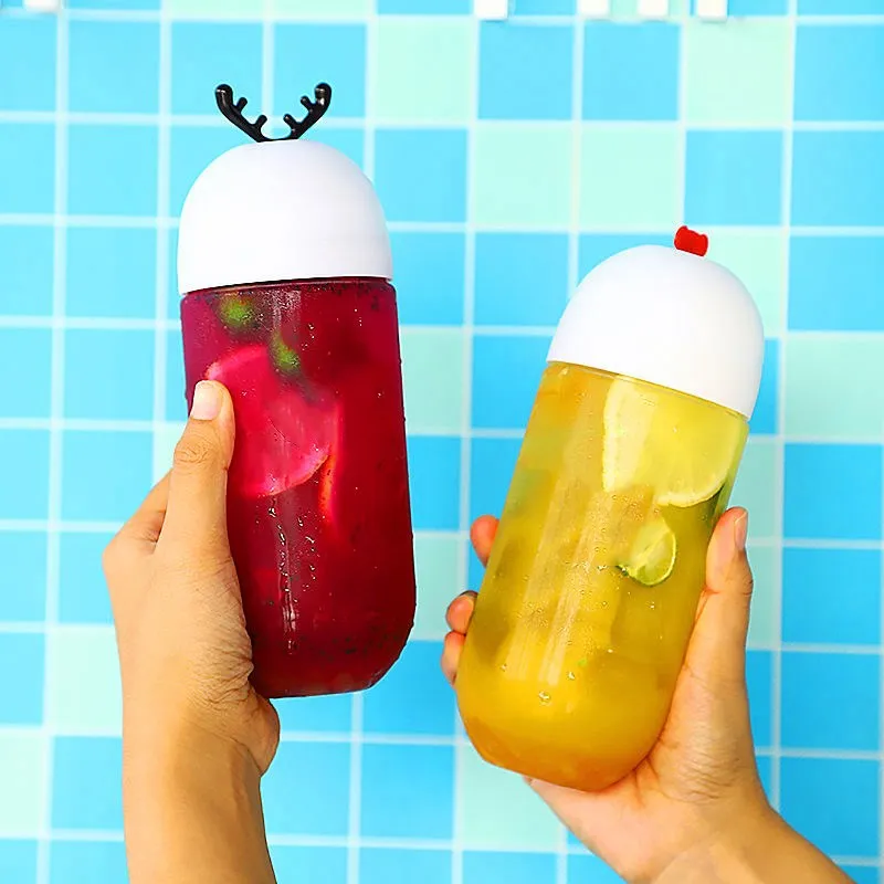 Hot Selling Capsule Shape Beverage Bottle Personalized Antler Stopper Transparent Plastic Bottle Creative Juice Bottle