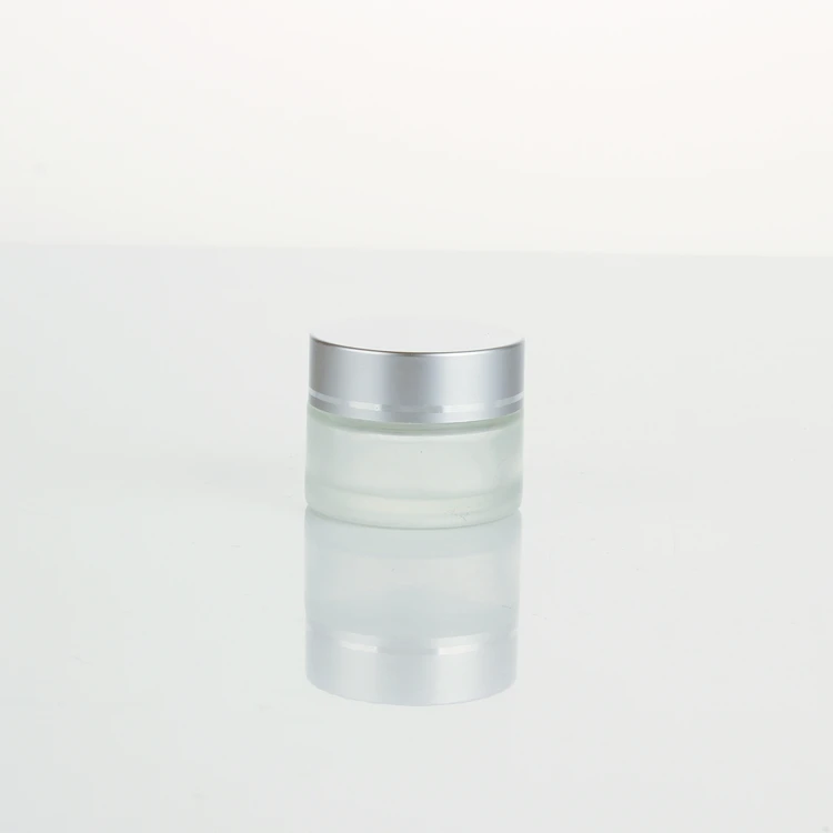 Empty glass jar with silver cover for stock Cream 50ml 100ml frosted empty glass frosting cans cosmetic packaging