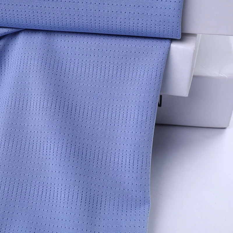 88%nylon 12%spandex knitting 4 way stretch elastic irregular hole mesh single jersey fabric for sportswear