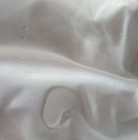 
PE film polyester taffeta woven fabric for Disposable civil protective clothes 