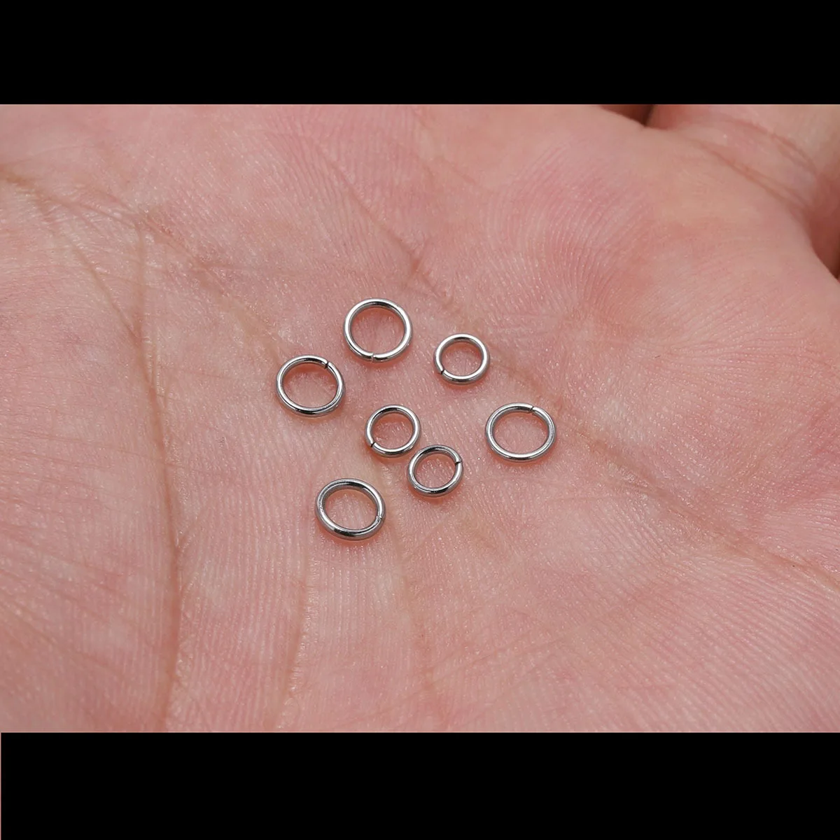 Wholesale of various sizes of stainless steel open loops at actual prices, used for DIY jewelry and jewelry making materials