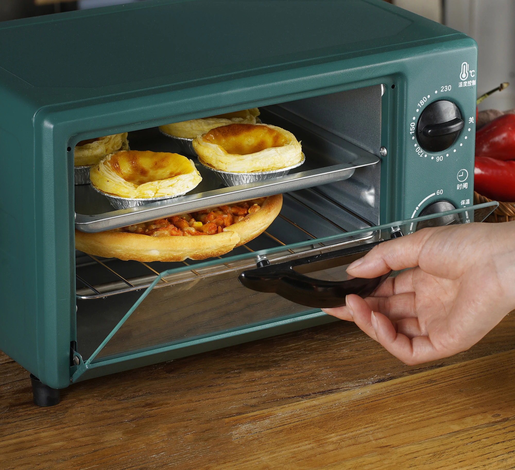 
 Factory price 700w mini toaster oven for pizza chicken bread home appliance electric ovens with timer and warmer  