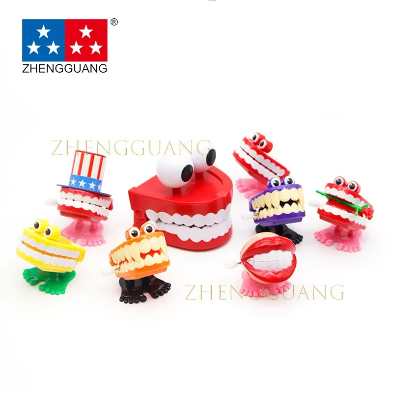 Zhengguang горячая Распродажа рекламная Новинка пластиковая заводная игрушка прыгающий призрак зубы