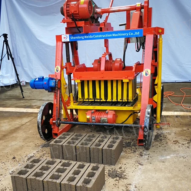 big wheels Africa Qtj4-40 mobile hydraulic brick pavers maker machine hollow block egg laying cement making machinery heavy duty