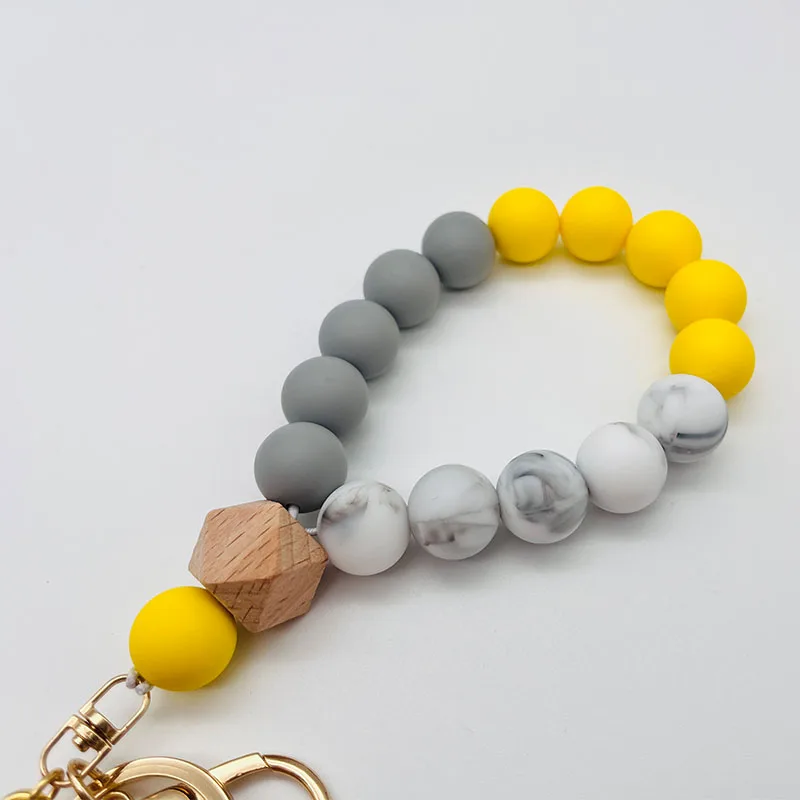 Customized Tassel Silicone Bead Bracelet Keychain Wristlet Elastic Macrame Beautiful Wood Silicone Beaded Monogram Keychain