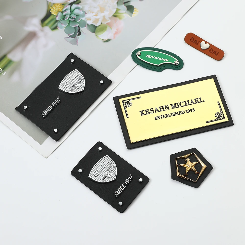 2024 good supplier metal logo labels with leather sewing label For Clothing Garment Metal Accessories