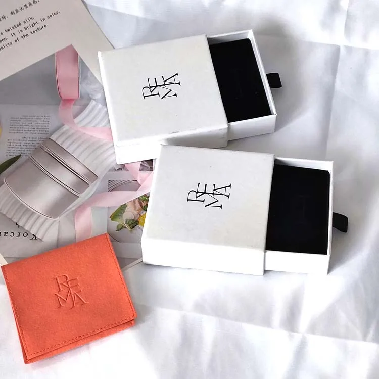 Custom Stamped Logo Stocked Cream Microfiber fabric suede pouch with flap & band beige color jewelry bags packaging