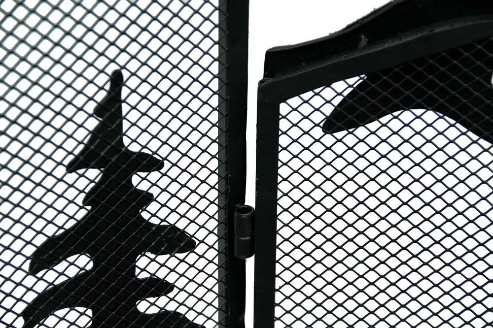The mesh design of the metal fireplace screen protects the room from the ember screen