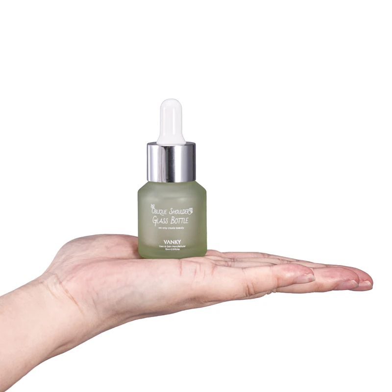 New Design Luxury 30ml 60ml 100ml Oblique Shoulder Bottle Customized Green Serum Essential Oil Dropper Glass Bottle With Pump