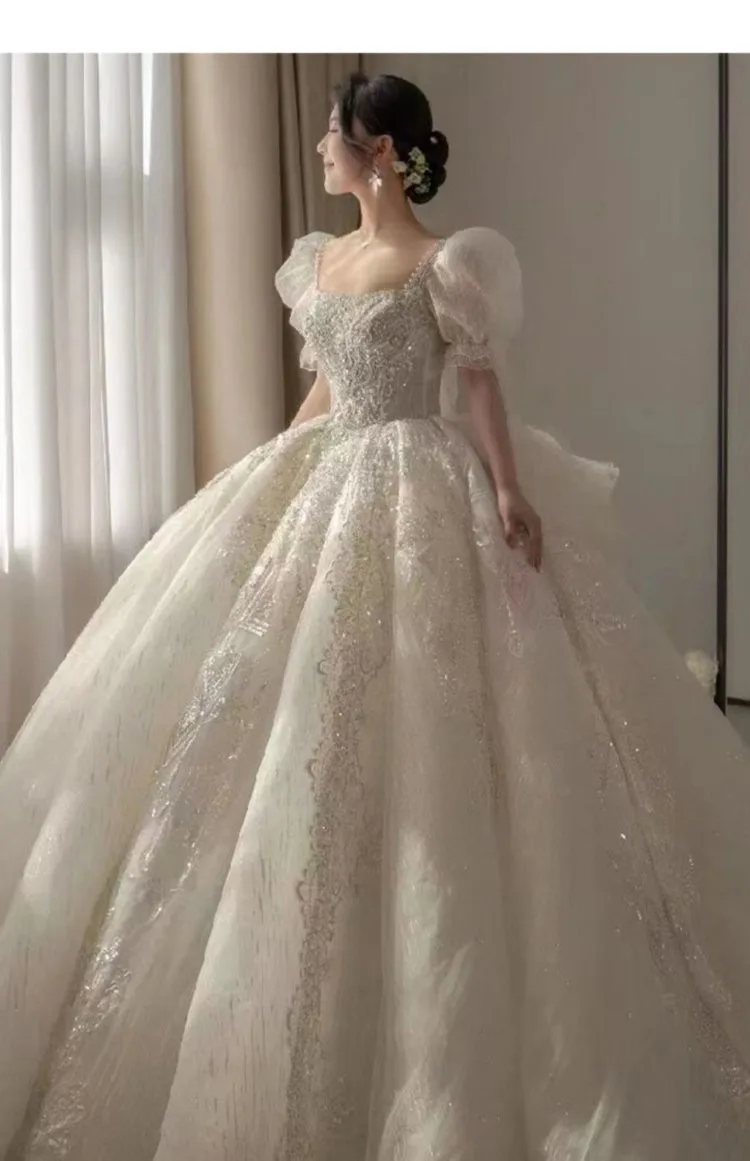 French light wedding dress 2023 new bride main yarn bubble sleeve trailing heavy industry wedding dress wholesale