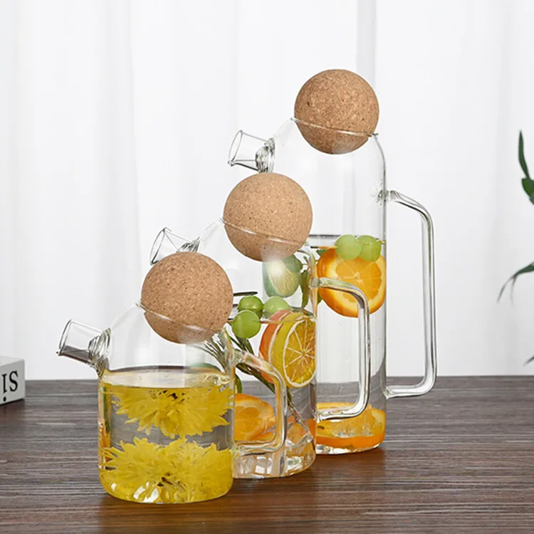 Wholesale Clear Insulated High Borosilicate Glass Carafe Pitcher With Cork Ball Lid and Handle for Water Tea Beverage