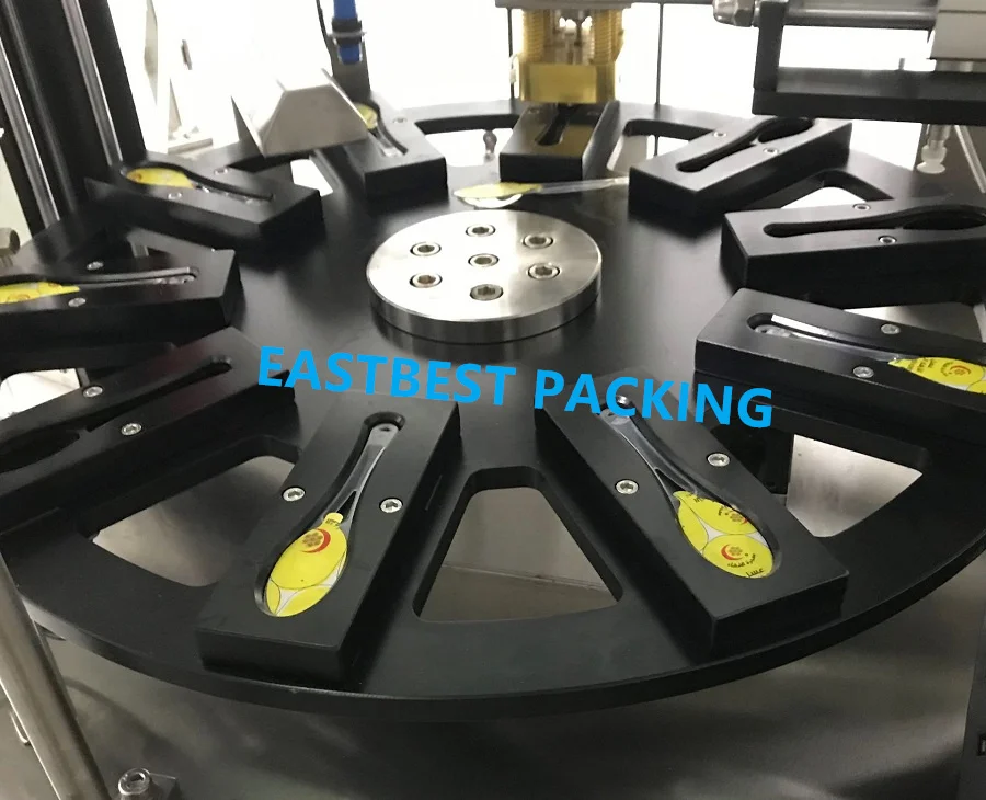 Honey Spoon Filling Sealing Machine Rotation Honey Plastic Spoon Packaging Machine 1~20g