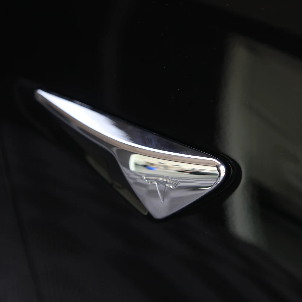 Tesla Model 3 plastic and carbon fiber side camera